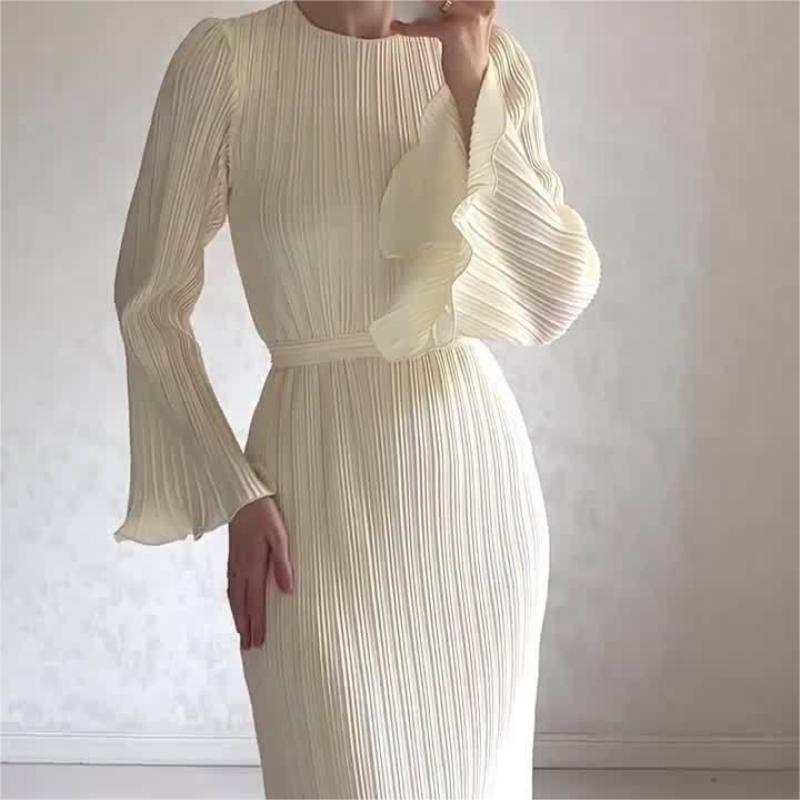 đ Ny elegant klĂ€nning med utsvĂ€ngda Ă€rmar â tidlös & smickrande!