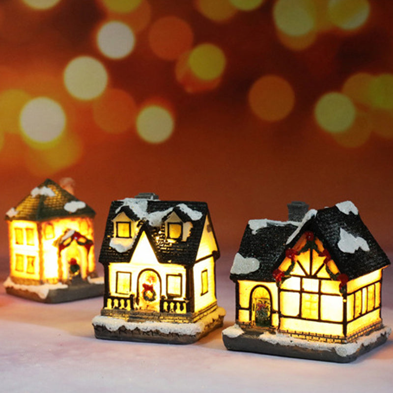 Miniatyr LED-belyst julbyhus