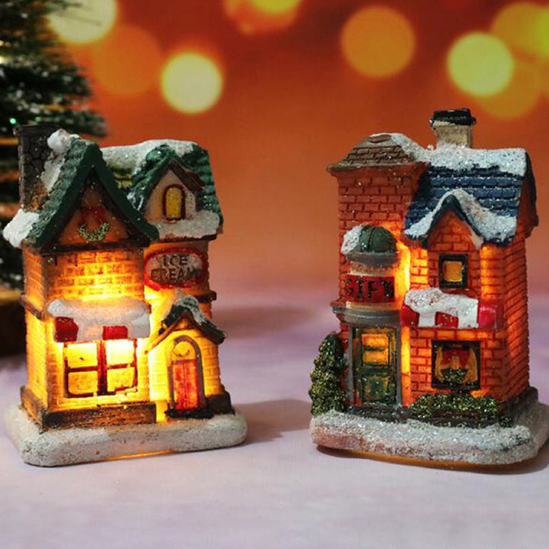 Miniatyr LED-belyst julbyhus