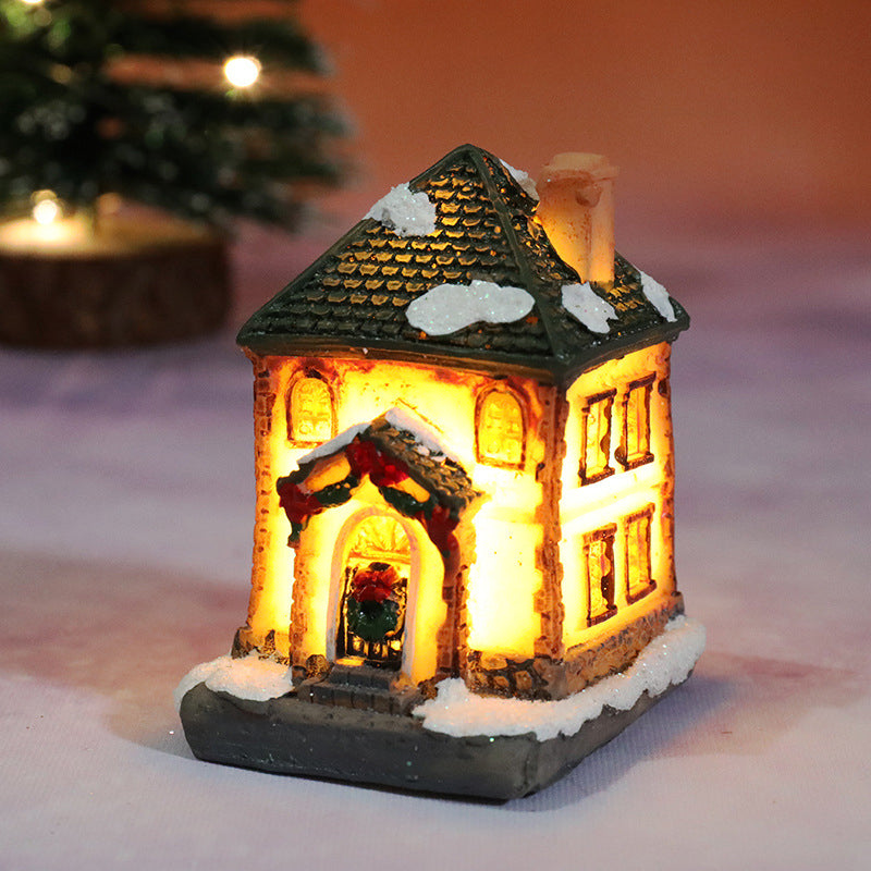 Miniatyr LED-belyst julbyhus