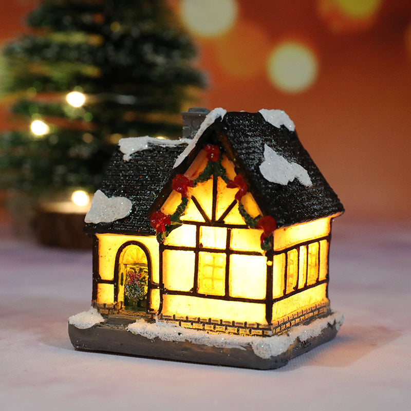 Miniatyr LED-belyst julbyhus
