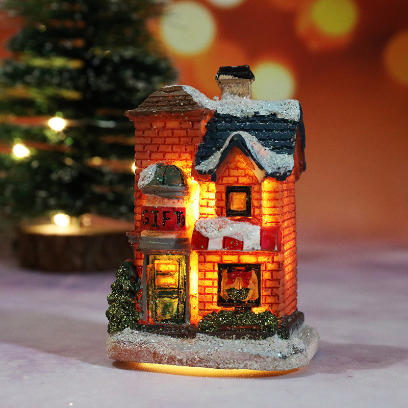 Miniatyr LED-belyst julbyhus