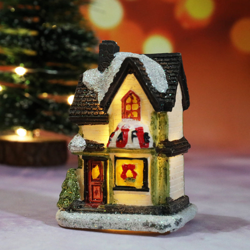Miniatyr LED-belyst julbyhus
