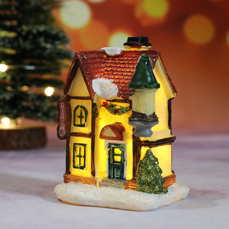 Miniatyr LED-belyst julbyhus