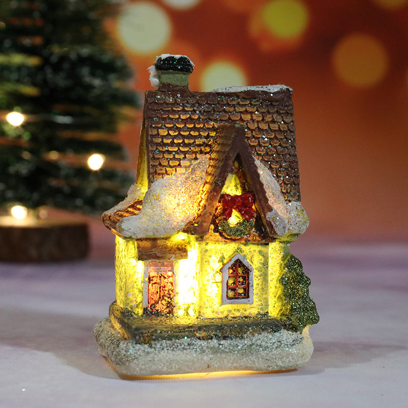 Miniatyr LED-belyst julbyhus