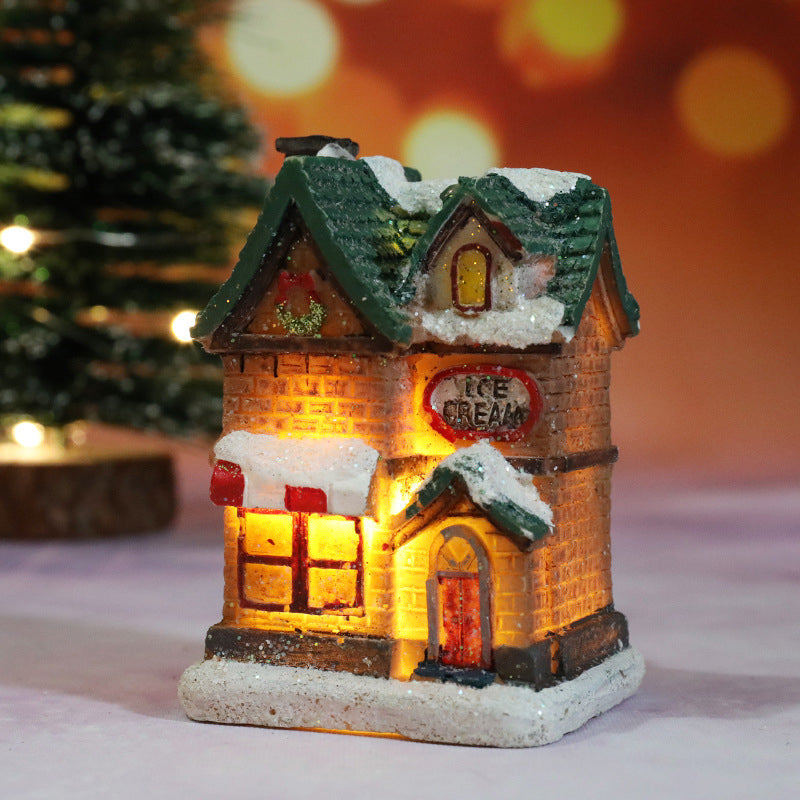 Miniatyr LED-belyst julbyhus