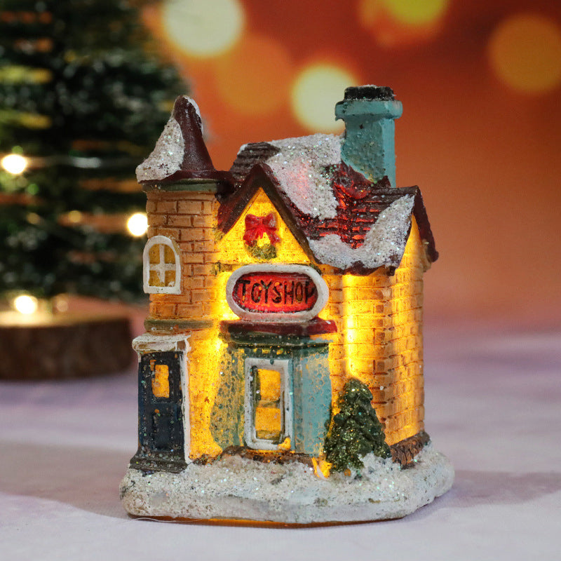 Miniatyr LED-belyst julbyhus
