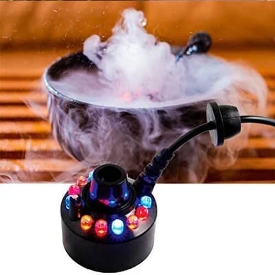 ⏳Tidsbegränsat specialerbjudande⏰ 12-LED ultraljudsdimskapare – Skapar sval dimma och färgglatt ljus – Perfekt för luftfuktare, fontäner eller Halloween-dekoration – går tyst i vatten 💧✨
