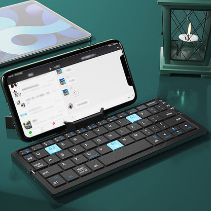 ✨ Nyhet 50 % RABATT💻Bärbar Mini Hopfällbar Tangentbord - Perfekt för Telefon, Surfplatta och Laptop