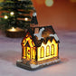 Miniatyr LED-belyst julbyhus
