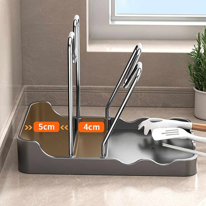 Multifunktionell lock- och skärbrädeshållare