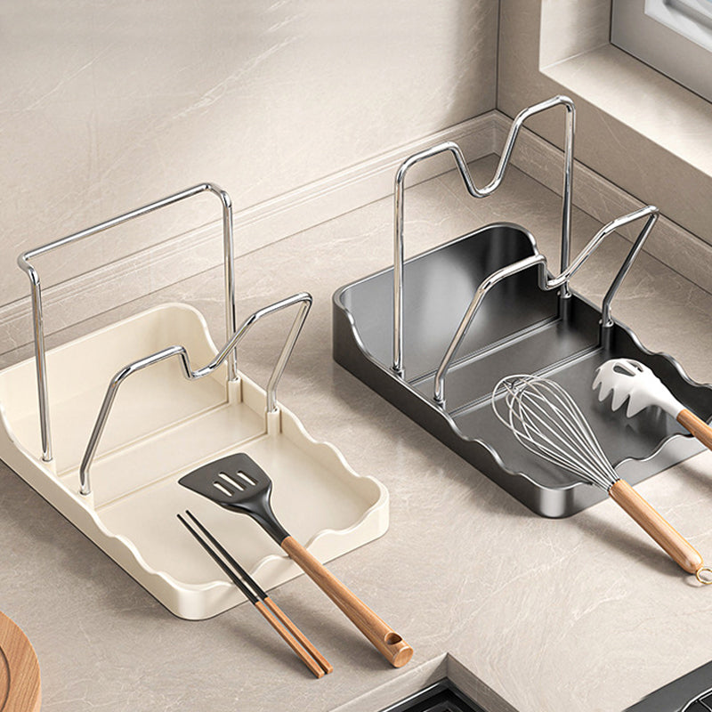 Multifunktionell lock- och skärbrädeshållare