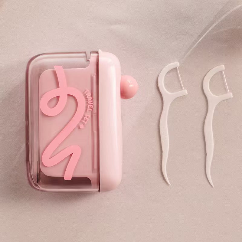 Automatisk pop-up tandtrådsdispenser med förvaring