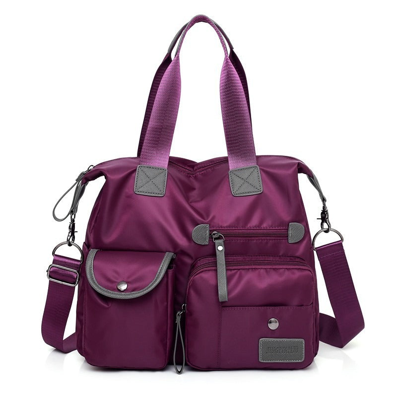 👜 50% RABATT NU! Stor vattentät tygväska för kvinnor – rymlig, tre bärsätt & smart fickorganisation – perfekt för jobb, resor & vardag 🧳✨