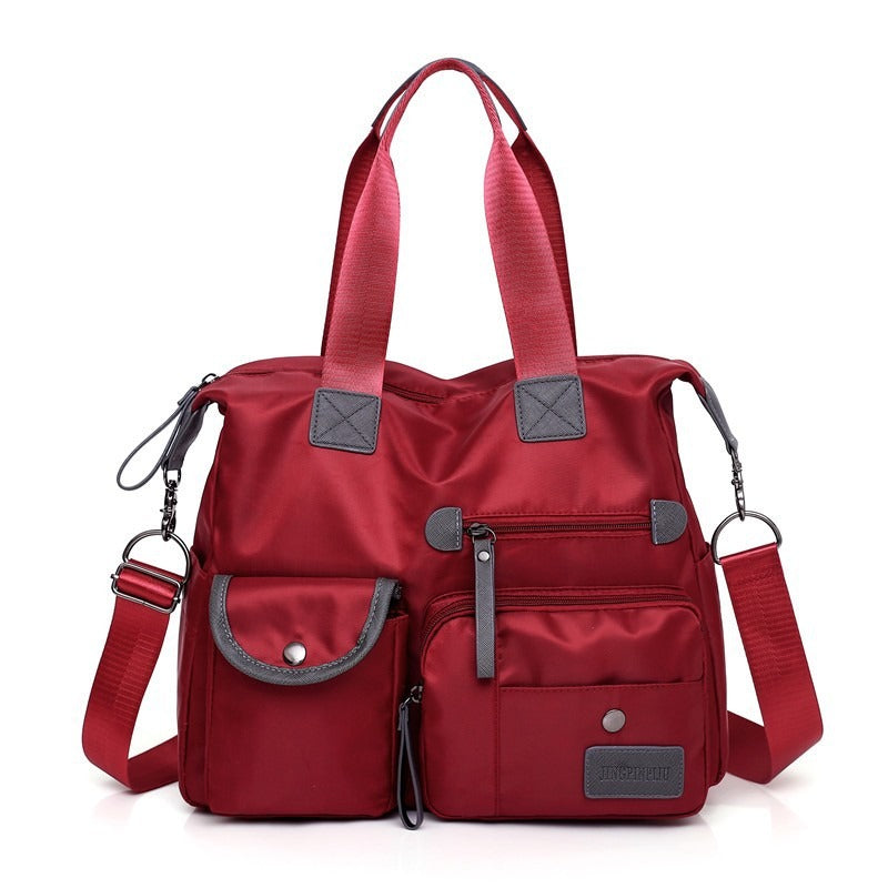 👜 50% RABATT NU! Stor vattentät tygväska för kvinnor – rymlig, tre bärsätt & smart fickorganisation – perfekt för jobb, resor & vardag 🧳✨