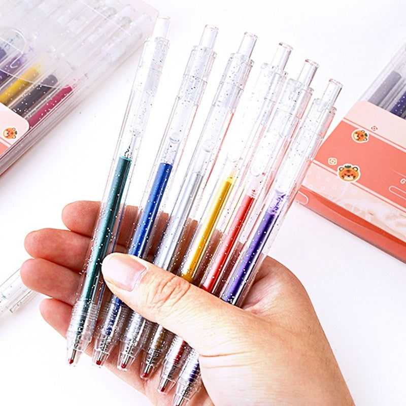 Set med infällbara glittergelpennor för journaling och teckning